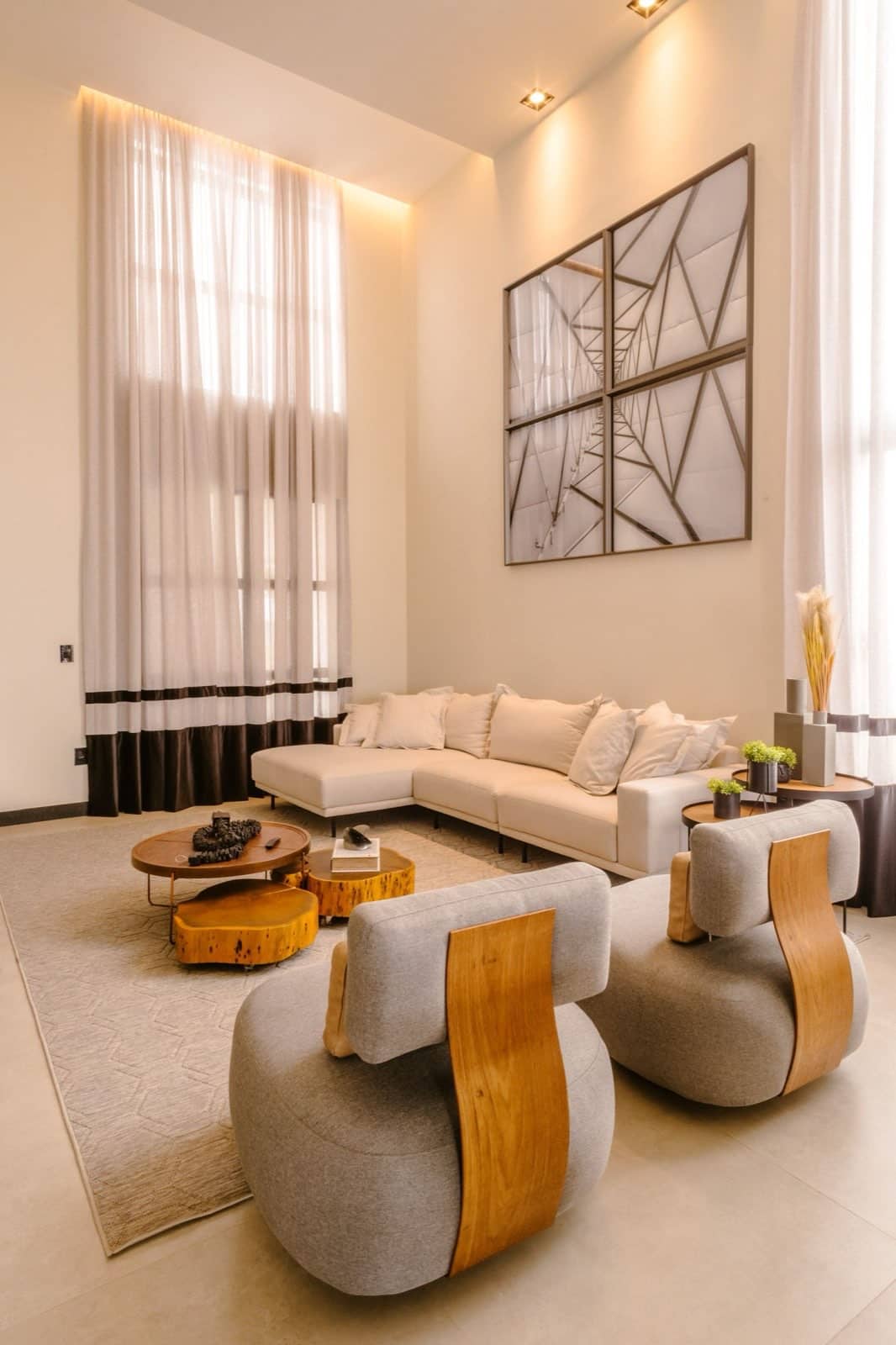A cozy, spotless, warmly lit living room