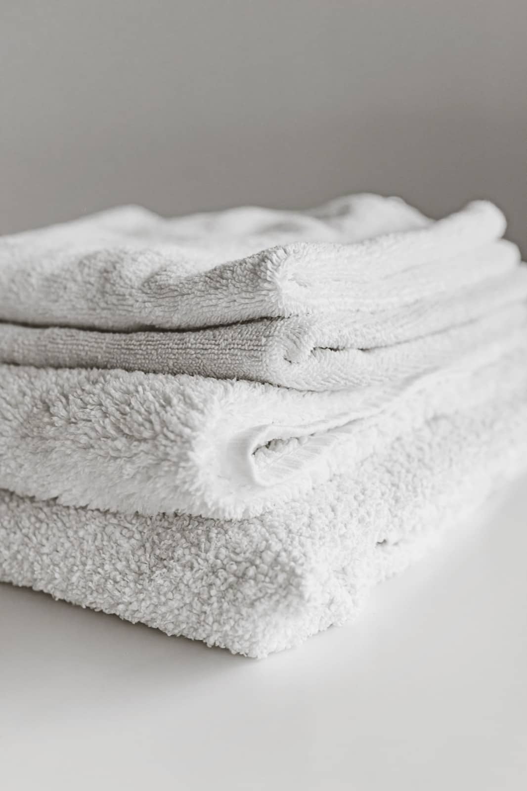 Fresh folded towels stacked neatly, ready to put away